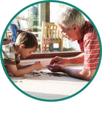 Grandson and grandfather counting change