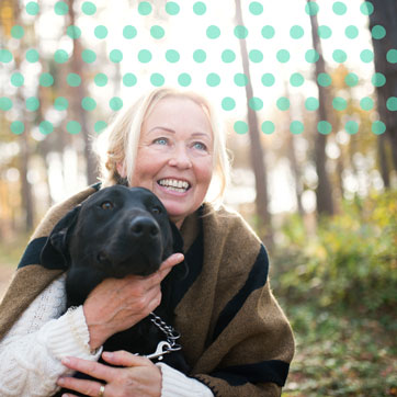 A woman hugging a dog
